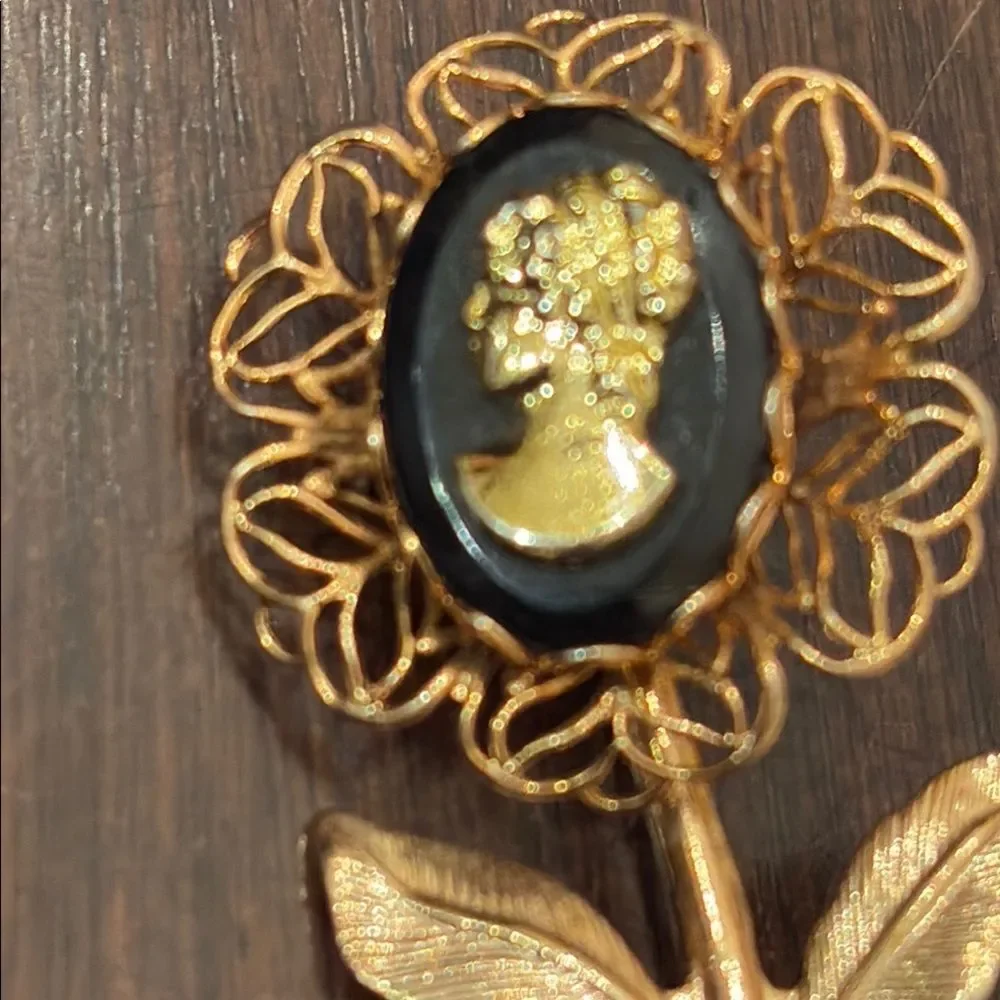 Intricate Gold and Black Flower Cameo Brooch